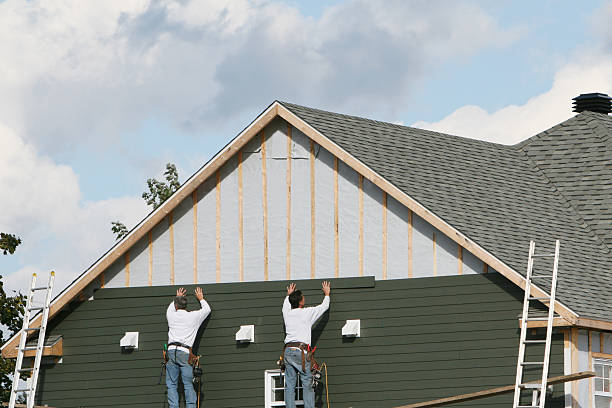 Professional Siding technician working in Alliance, NC